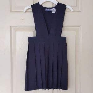 Girl's School uniform overalls.